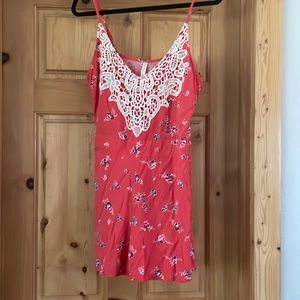 Coral romper, size XL.